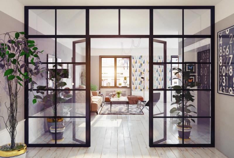 Une verri&egrave;re associant bois et m&eacute;tal structure un int&eacute;rieur sans cloisonner l'espace